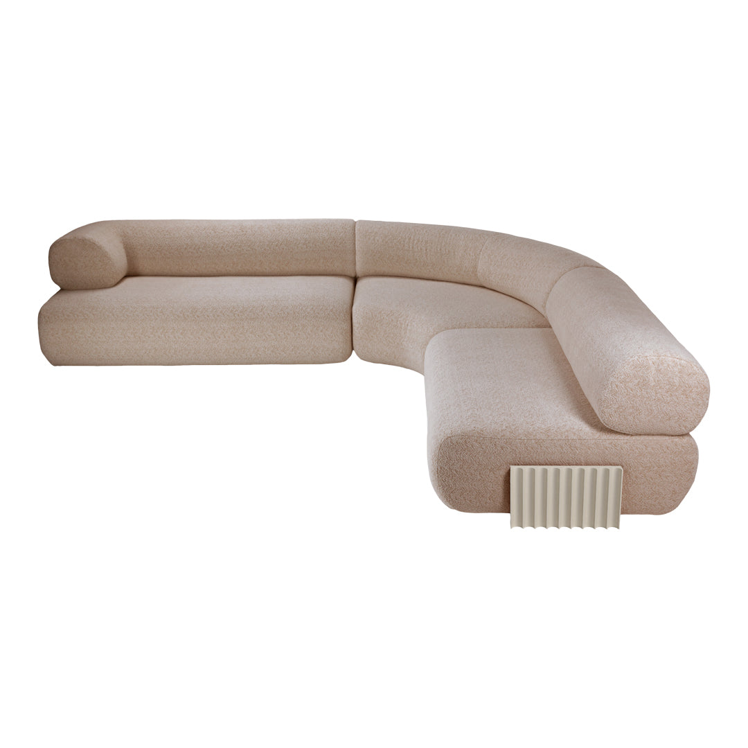 Curved beige sectional sofa with a textured fabric pattern and soft, rounded edges for modern living spaces.
