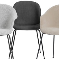 "Set of three modern chairs in light gray, dark gray, and beige upholstery with sleek black legs."