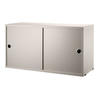 Light grey sliding door storage cabinet with a smooth, minimalist design and subtle matte finish.