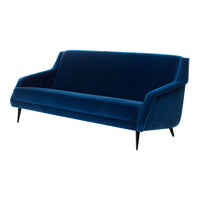 Deep blue velvet sofa with sleek lines and tapered black legs, perfect for modern living spaces.