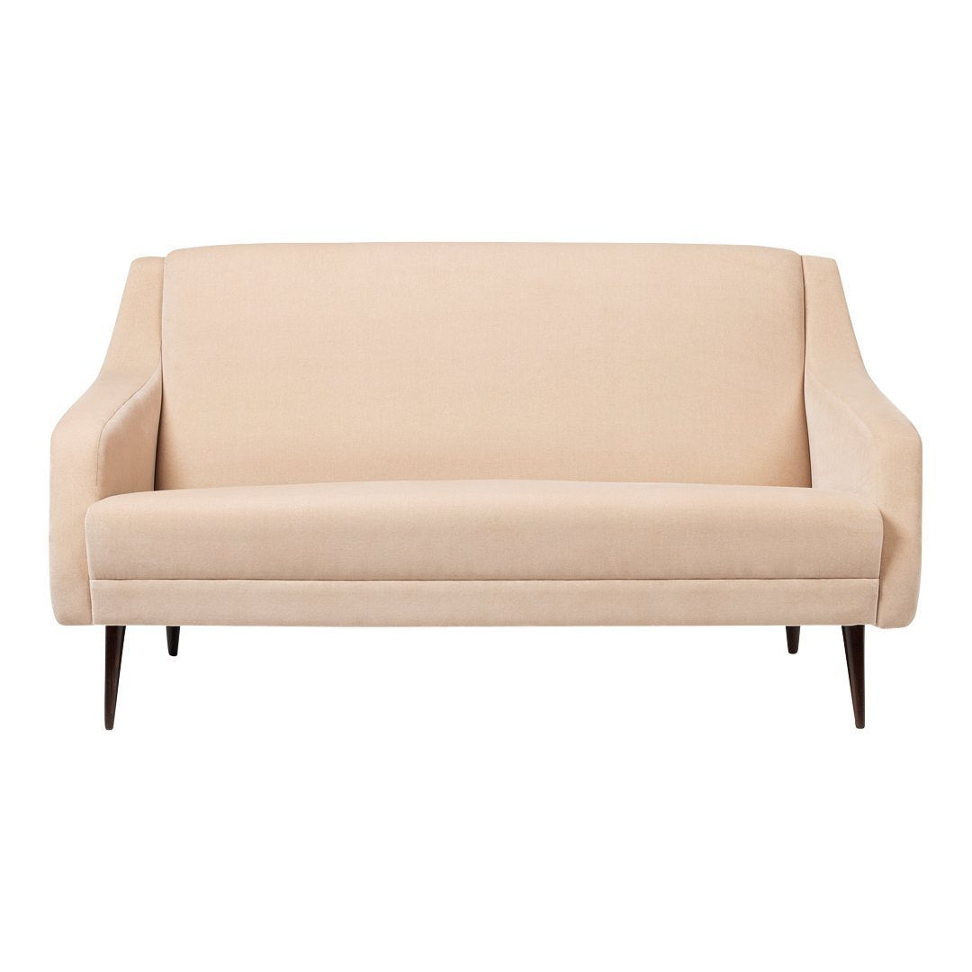 Beige upholstered sofa with smooth texture and mid-century modern design, featuring wooden legs.