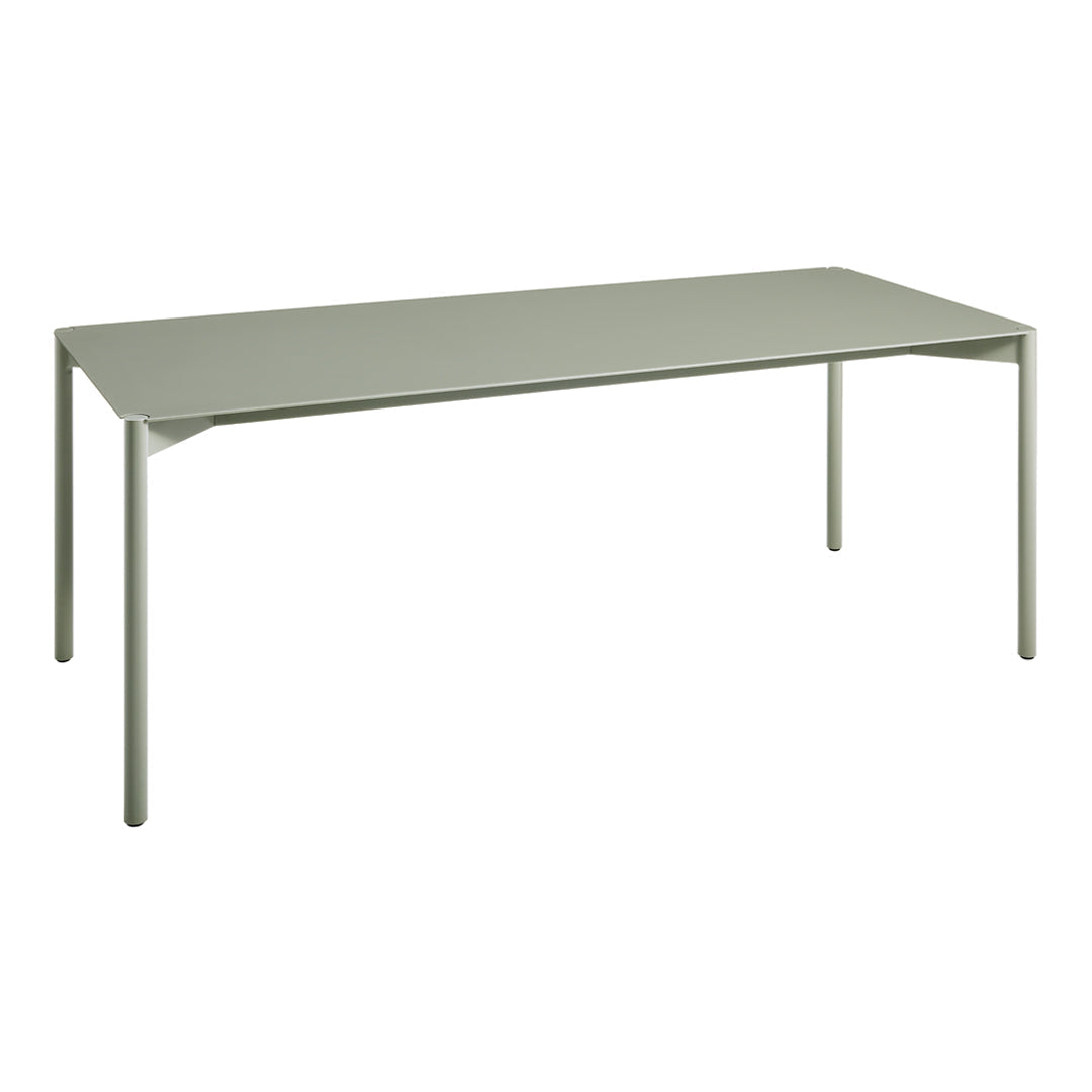 Modern rectangular dining table in soft green with a smooth, minimalist design and sturdy legs. Perfect for any space.