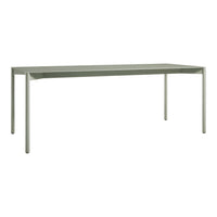 Light green rectangular table with a smooth, minimalistic design and sturdy legs, perfect for modern decor.