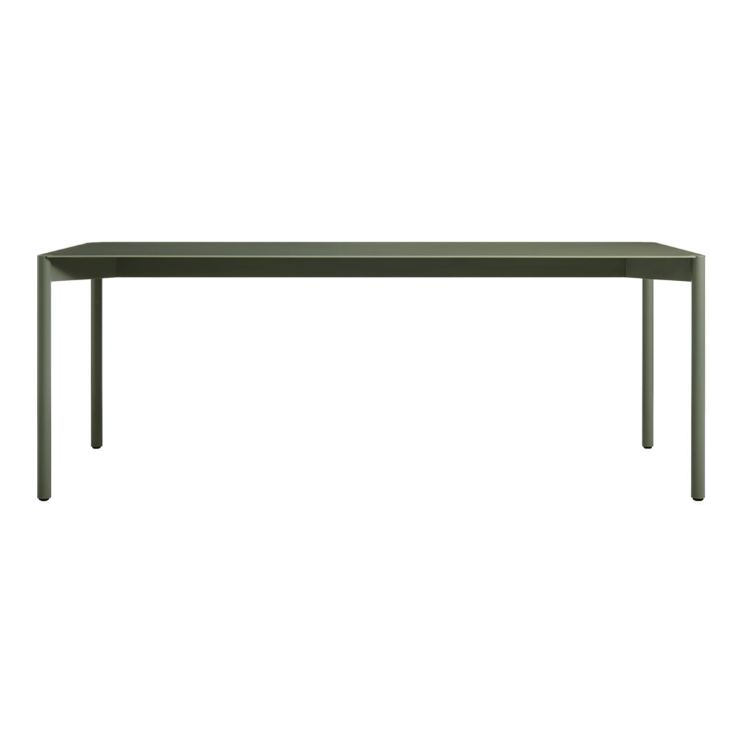 Green modern dining table with a sleek, minimalist design and solid rectangular top. Perfect for contemporary decor.