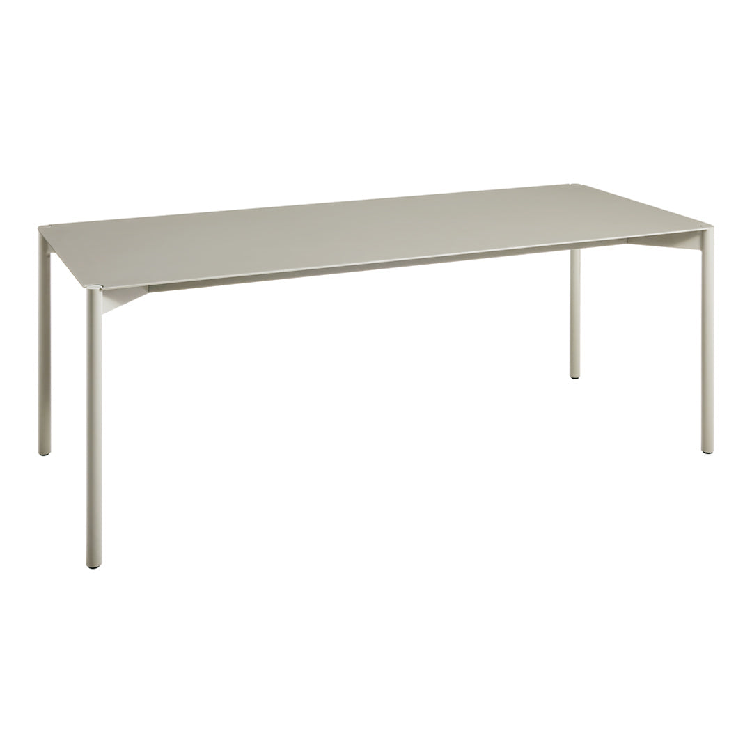Light gray rectangular table with a smooth surface and sleek, minimalistic design. Ideal for modern interiors.