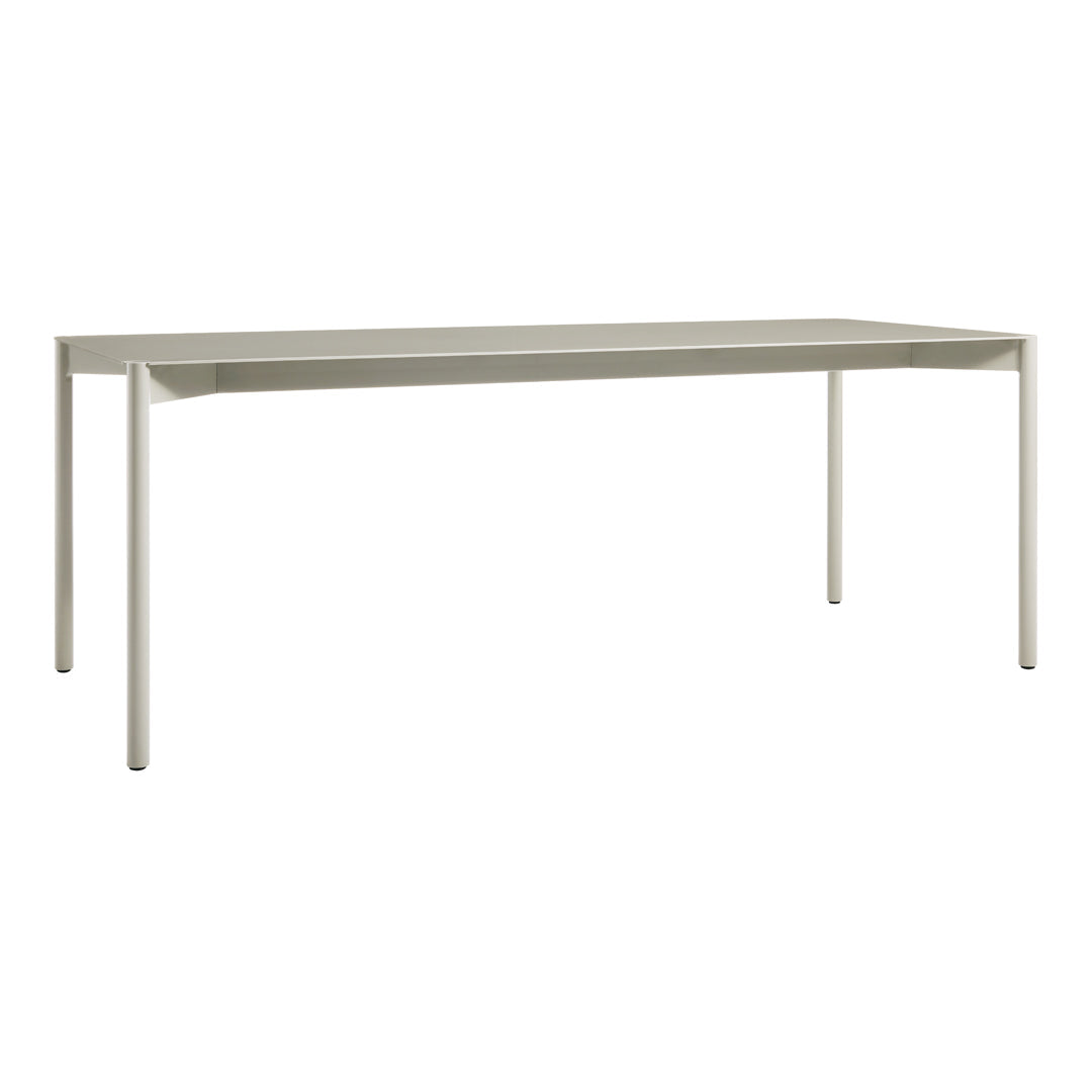 Modern, light gray rectangular table with a sleek, minimalist design and smooth, solid surface. Ideal for any decor.