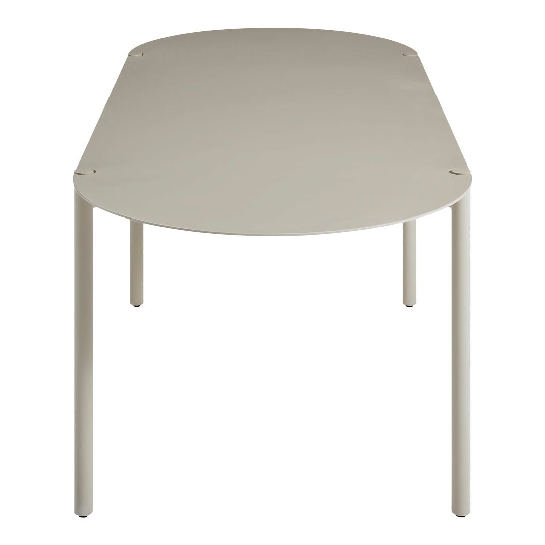 Light beige oval table with a smooth, matte finish and sleek, minimalist legs. Ideal for modern interiors.