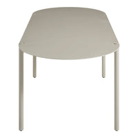 Light beige oval table with a smooth, matte finish and sleek, minimalist legs. Ideal for modern interiors.