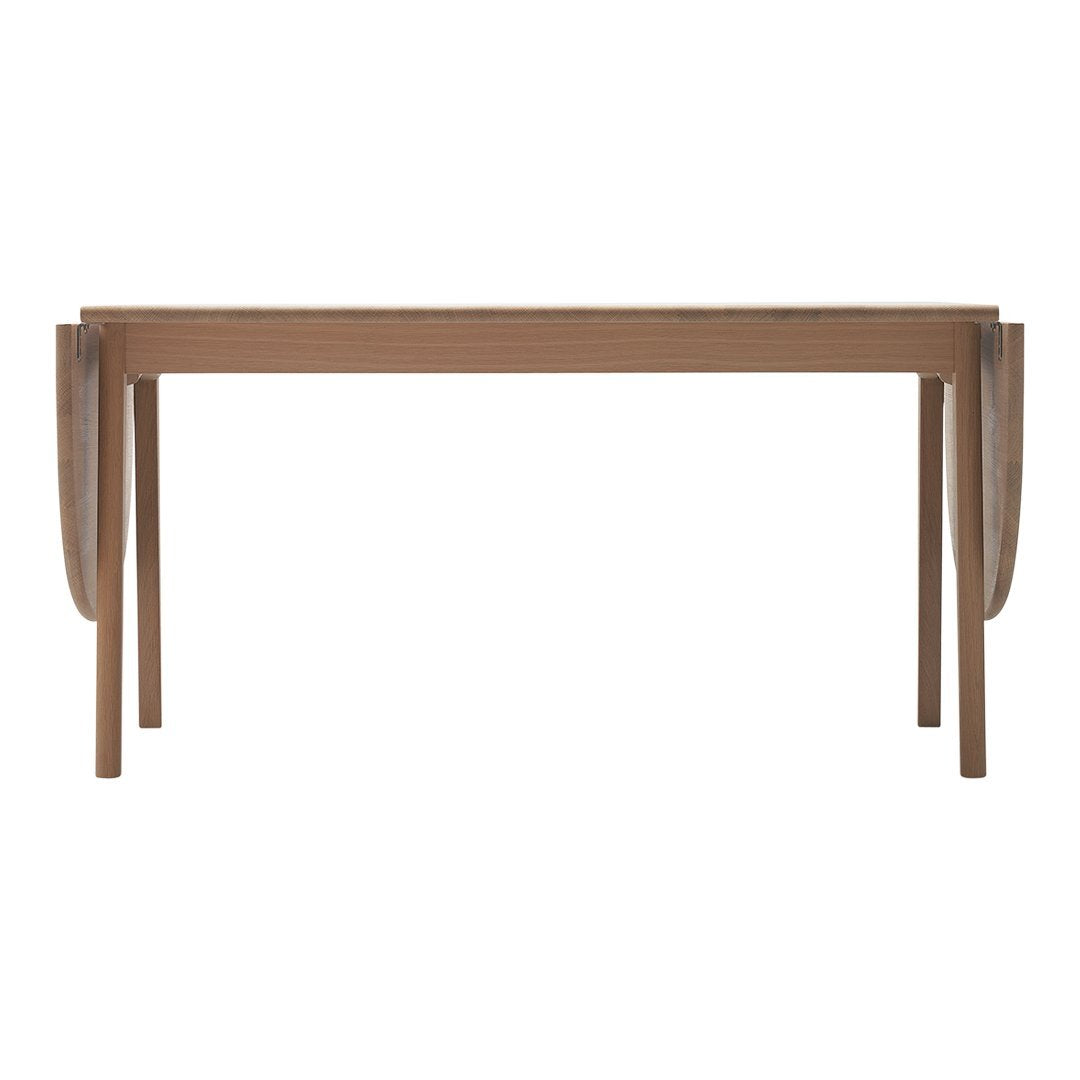 Natural wood dining table with a warm brown finish and clean, minimalist lines. Perfect for modern interiors.