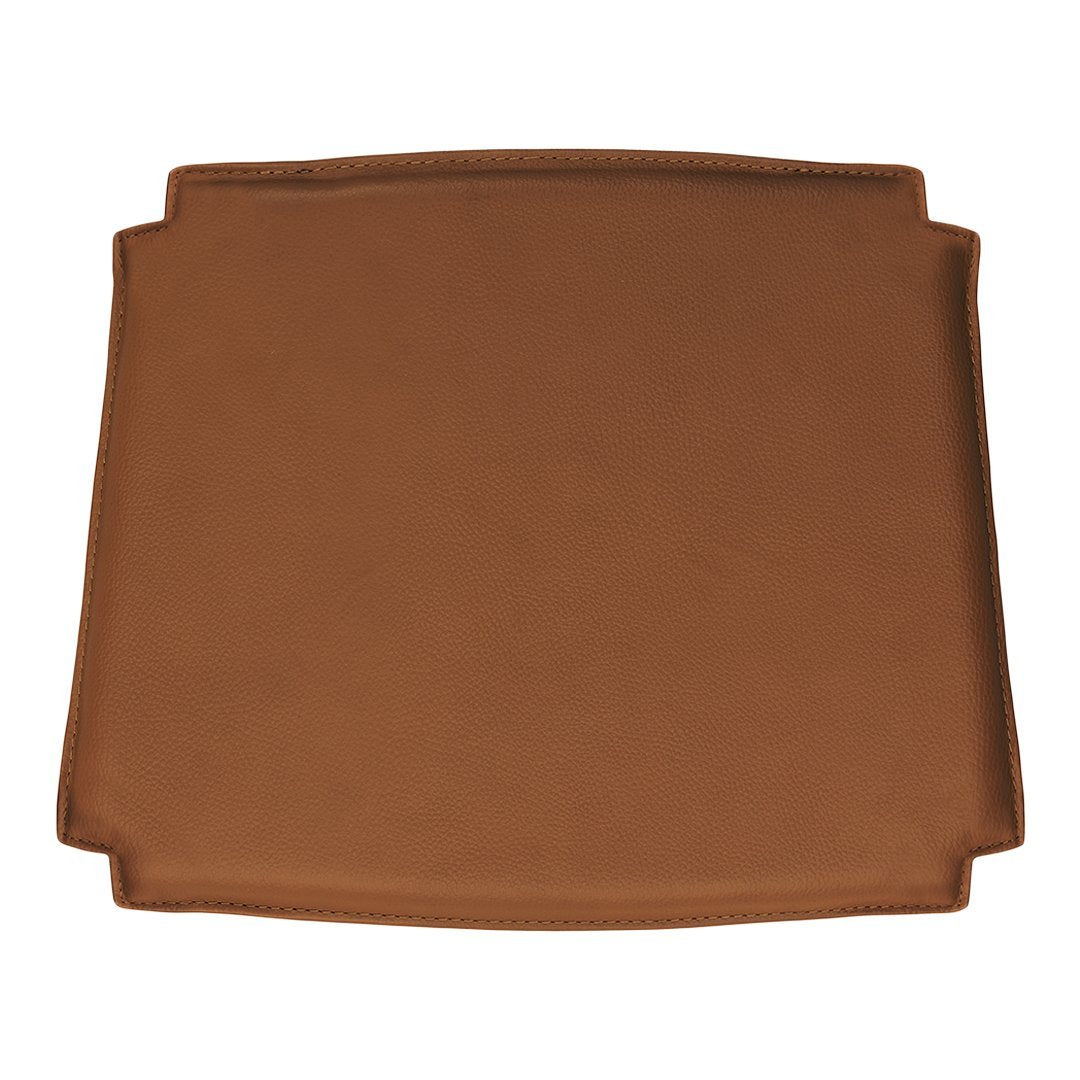Brown square ceramic plate with a smooth matte finish and rounded corners, perfect for stylish dining.