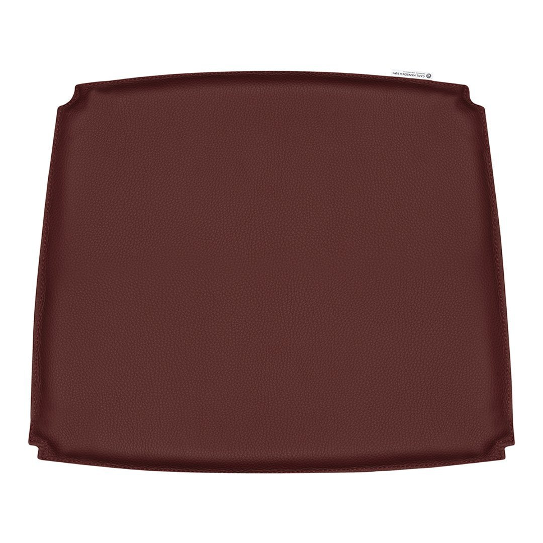 Brown square serving tray with a smooth finish and rounded corners, perfect for dining or entertaining.