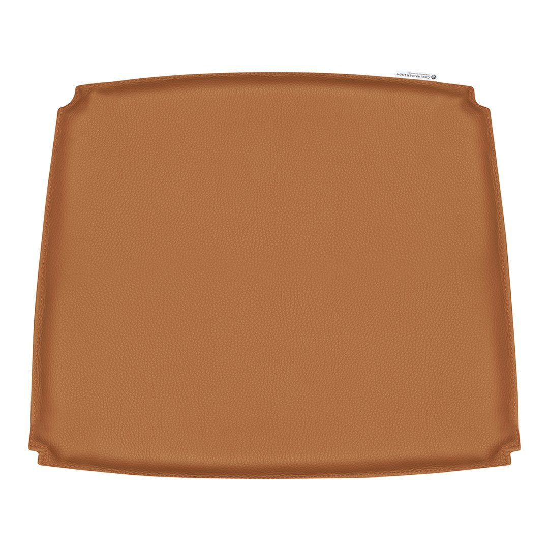 Brown square baking tray with a smooth, glossy finish, featuring rounded edges for easy handling.