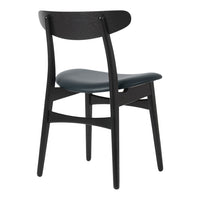 Black wooden chair with a sleek dark green seat, showcasing a minimalist design and smooth finish.