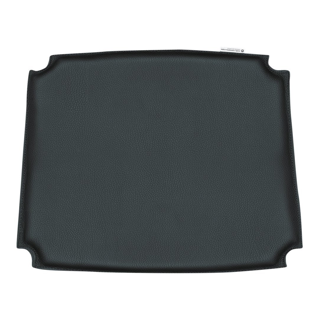 Black rectangular tray with smooth, solid surface and curved edges, perfect for dining and serving needs.