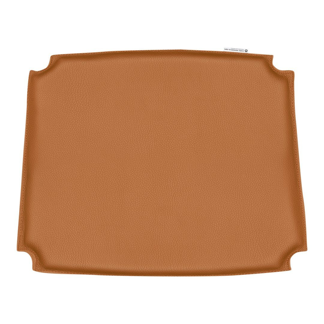 Brown rectangular silicone baking mat with a smooth, non-stick surface and rounded corners, perfect for various baking needs.
