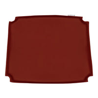 Deep red silicone baking mat with a smooth surface and rounded edges, ideal for non-stick cooking and baking.