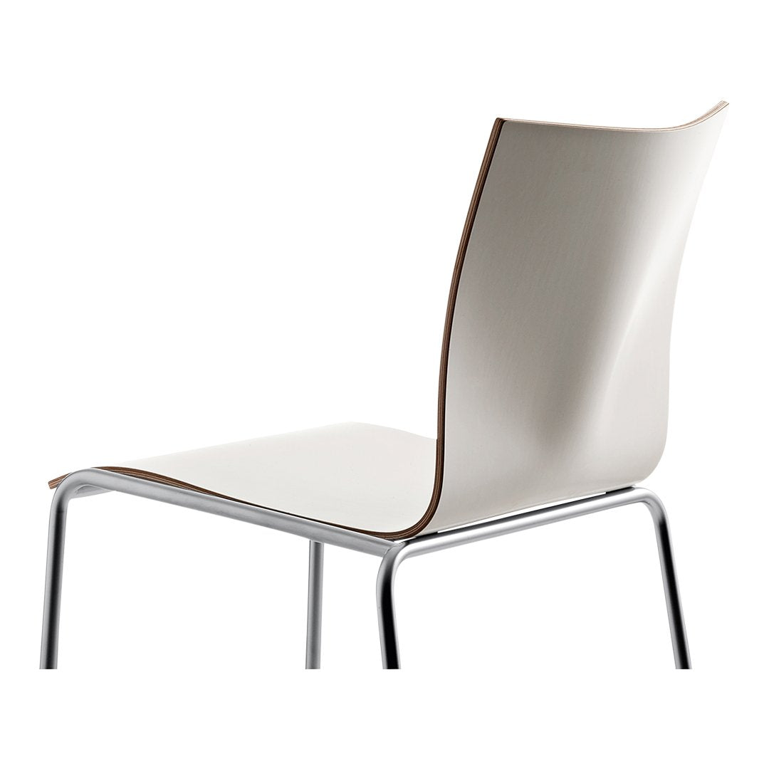 Sleek white chair with smooth curves and a subtle wood accent along the edges, featuring a minimalist design.