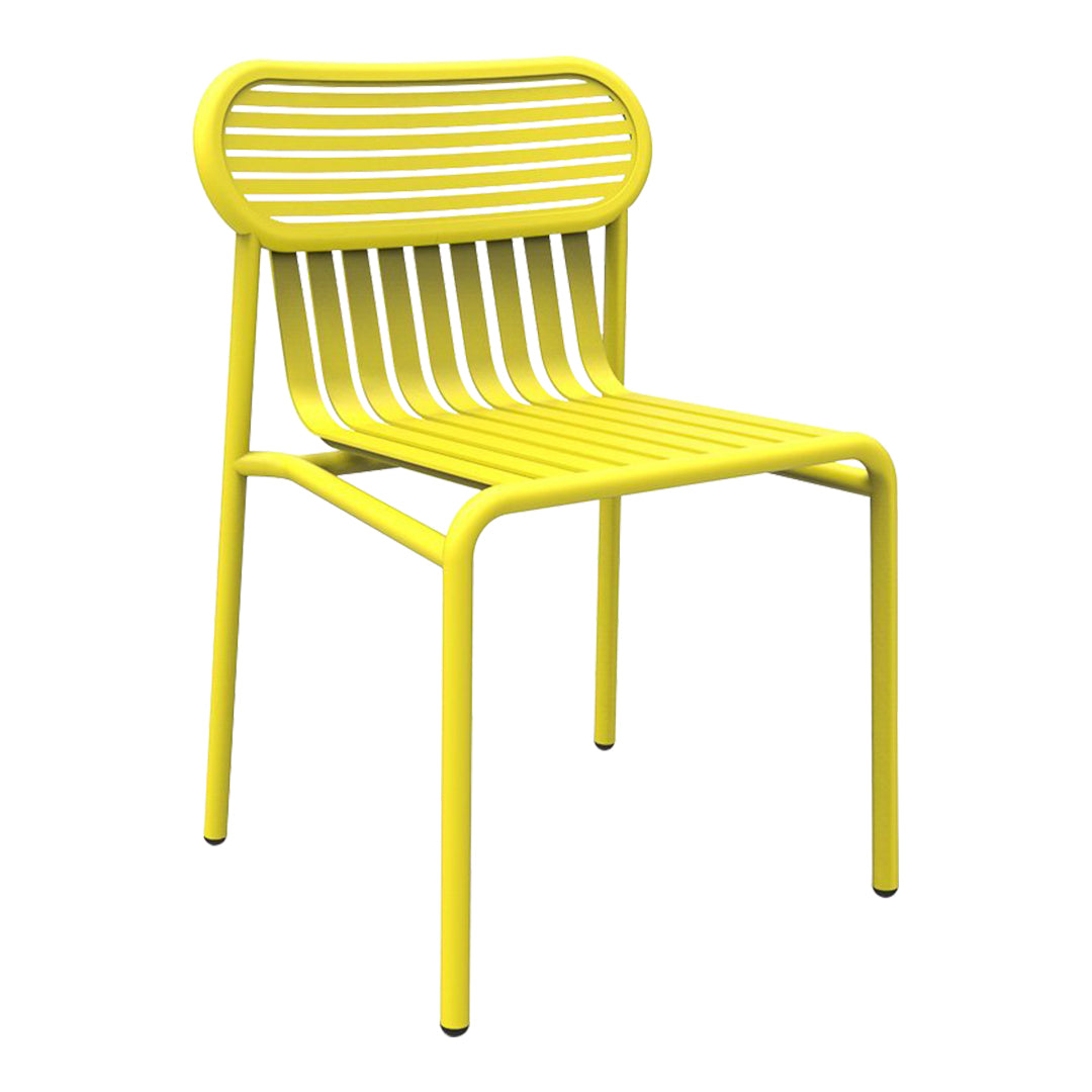 Bright yellow slatted chair with a modern design, perfect for outdoor or indoor decor.