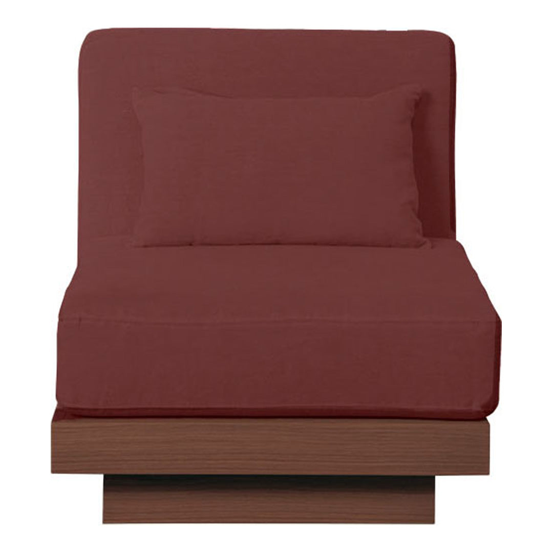 Red upholstered chaise lounge with a solid color and a sleek wooden base, perfect for modern decor.
