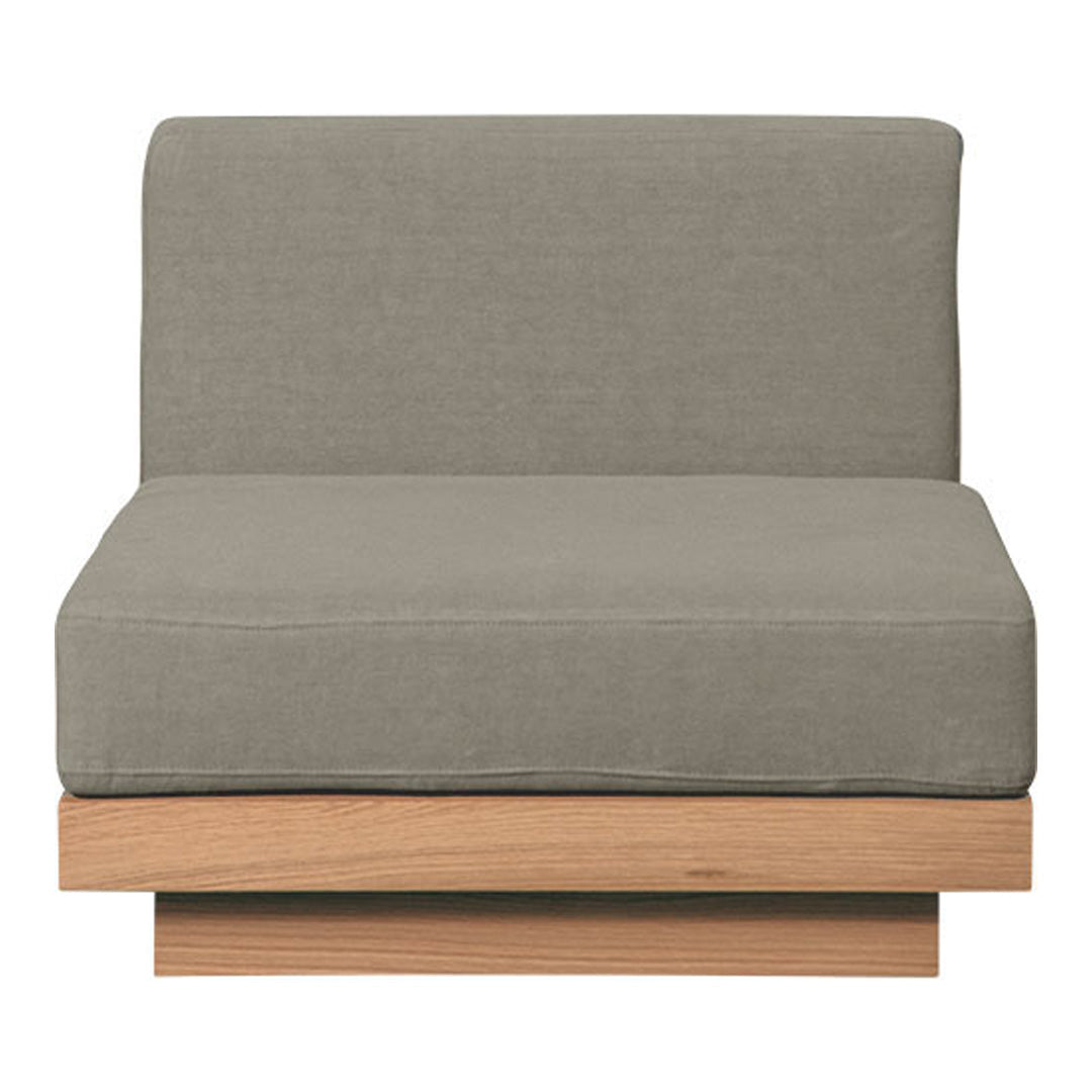 Gray upholstered chair with a minimalist design and natural wood base, featuring a smooth, solid color fabric.