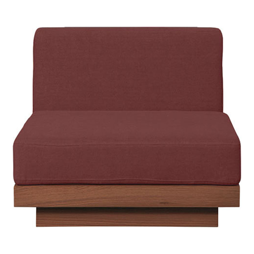 Rich burgundy fabric lounge chair with a smooth wood base, minimalistic design, perfect for modern interiors.