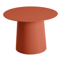 Round terracotta table featuring a smooth, matte finish and minimalist design, perfect for contemporary decor.