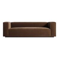 Brown velvet sofa with sleek, modern lines and a minimalist design. Ideal for contemporary interiors.