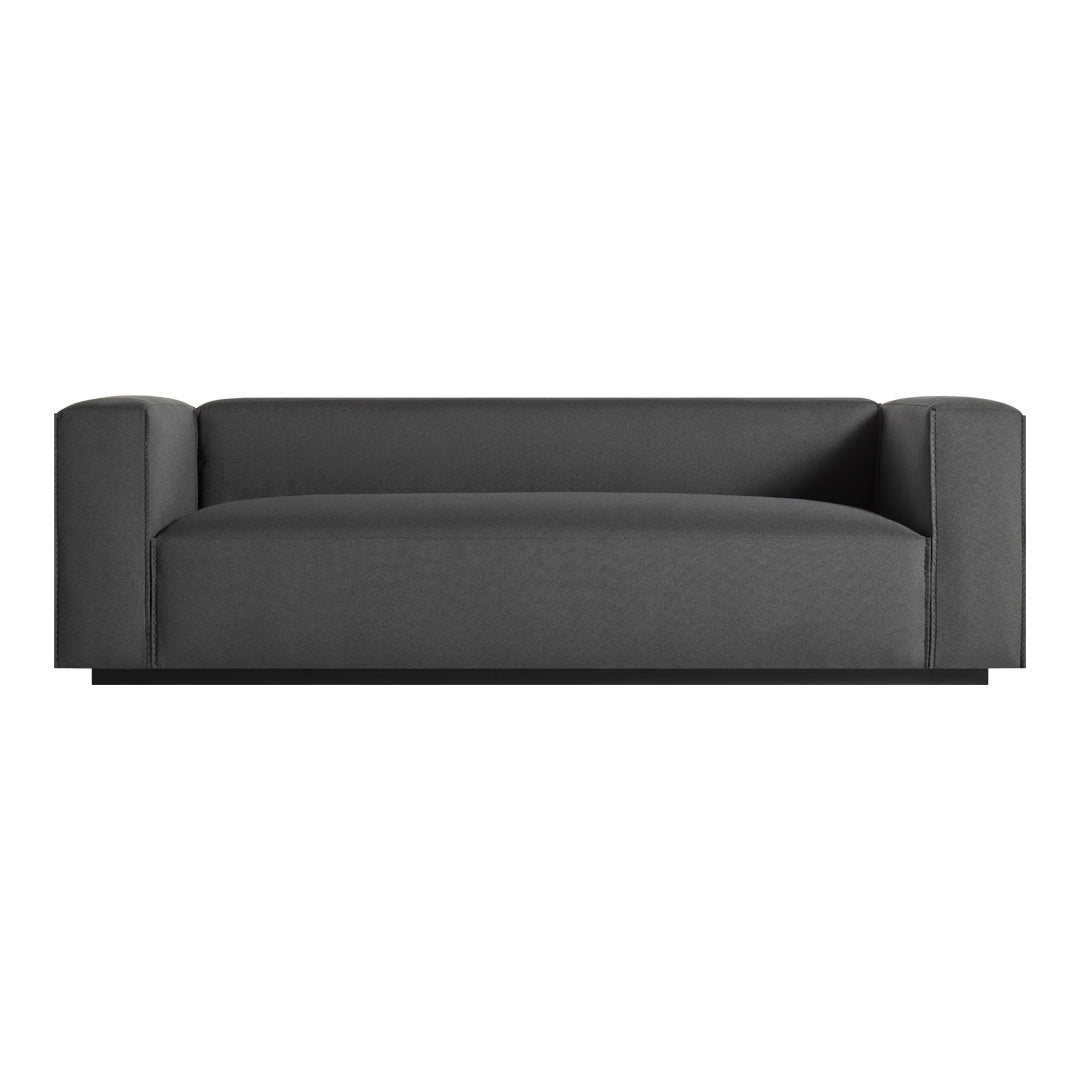 Sleek gray sofa with a minimalist design and smooth fabric finish, featuring solid, modern lines.