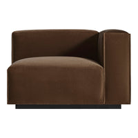 Brown velvet armchair with a minimalist design and smooth, sleek finish. Perfect for modern interiors.