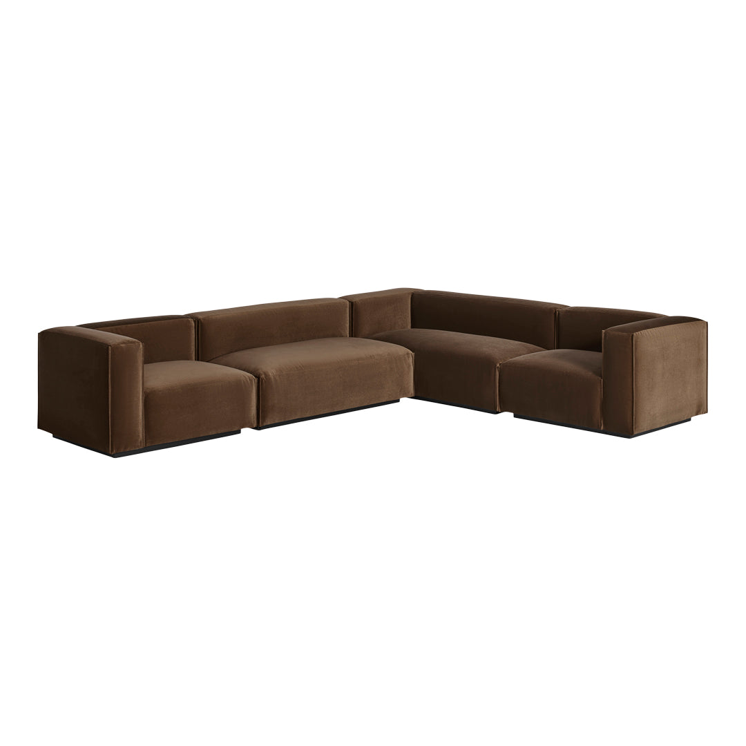 Brown sectional sofa with a modern design, featuring a sleek, smooth texture and seamless, angular shapes.