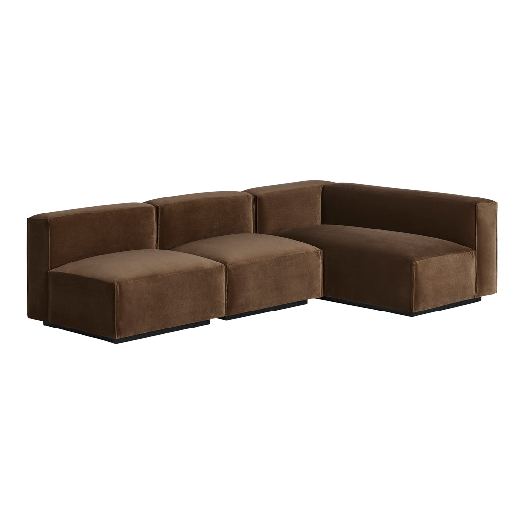 Luxe brown velvet sectional sofa with smooth, clean lines and a modern design, perfect for contemporary spaces.