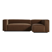 Brown velvet sofa with clean lines and a modern design, featuring a textured, plush surface for added comfort.