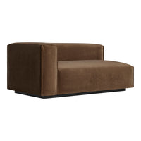 Brown velvet accent chair with a smooth, modern design, featuring solid, clean lines. Ideal for contemporary decor.
