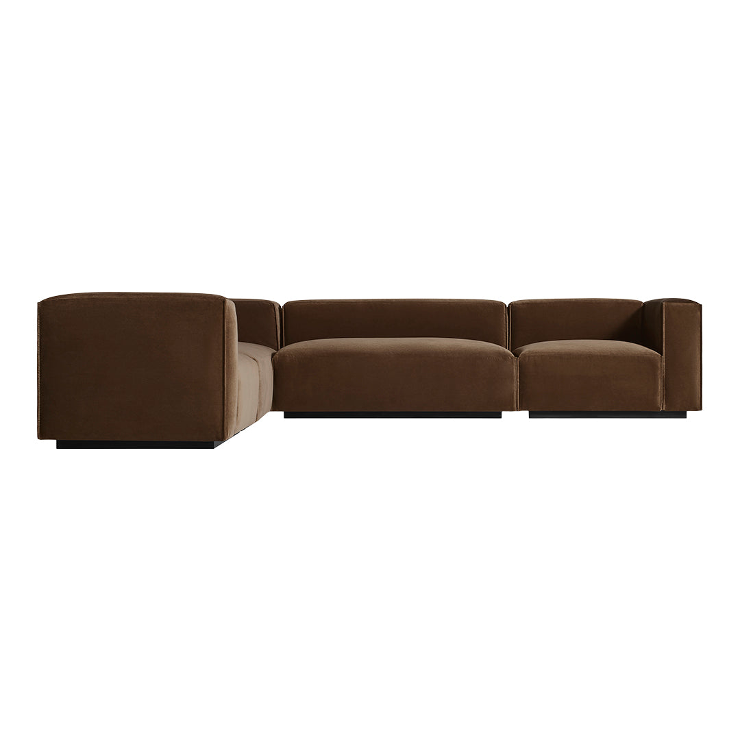 Brown velvet sectional sofa with clean lines and minimalistic design, perfect for modern living spaces.