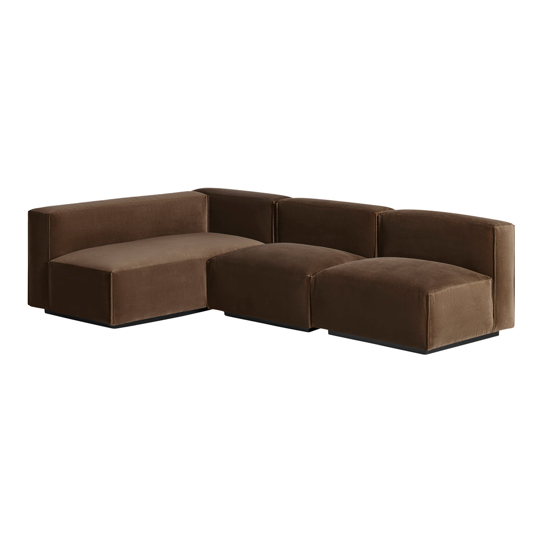 Brown velvet sectional sofa with a modern, minimalist design and smooth, plush texture. Ideal for contemporary interiors.