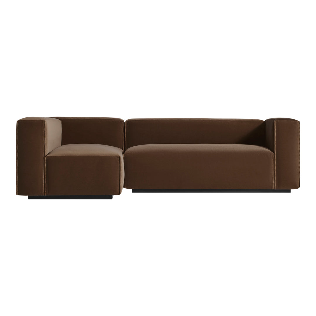 Brown sectional sofa with a modern, minimalist design and smooth fabric upholstery. Perfect for contemporary interiors.
