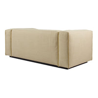 Beige block sofa with a smooth, solid texture and minimalistic design, featuring clean lines and a dark base.
