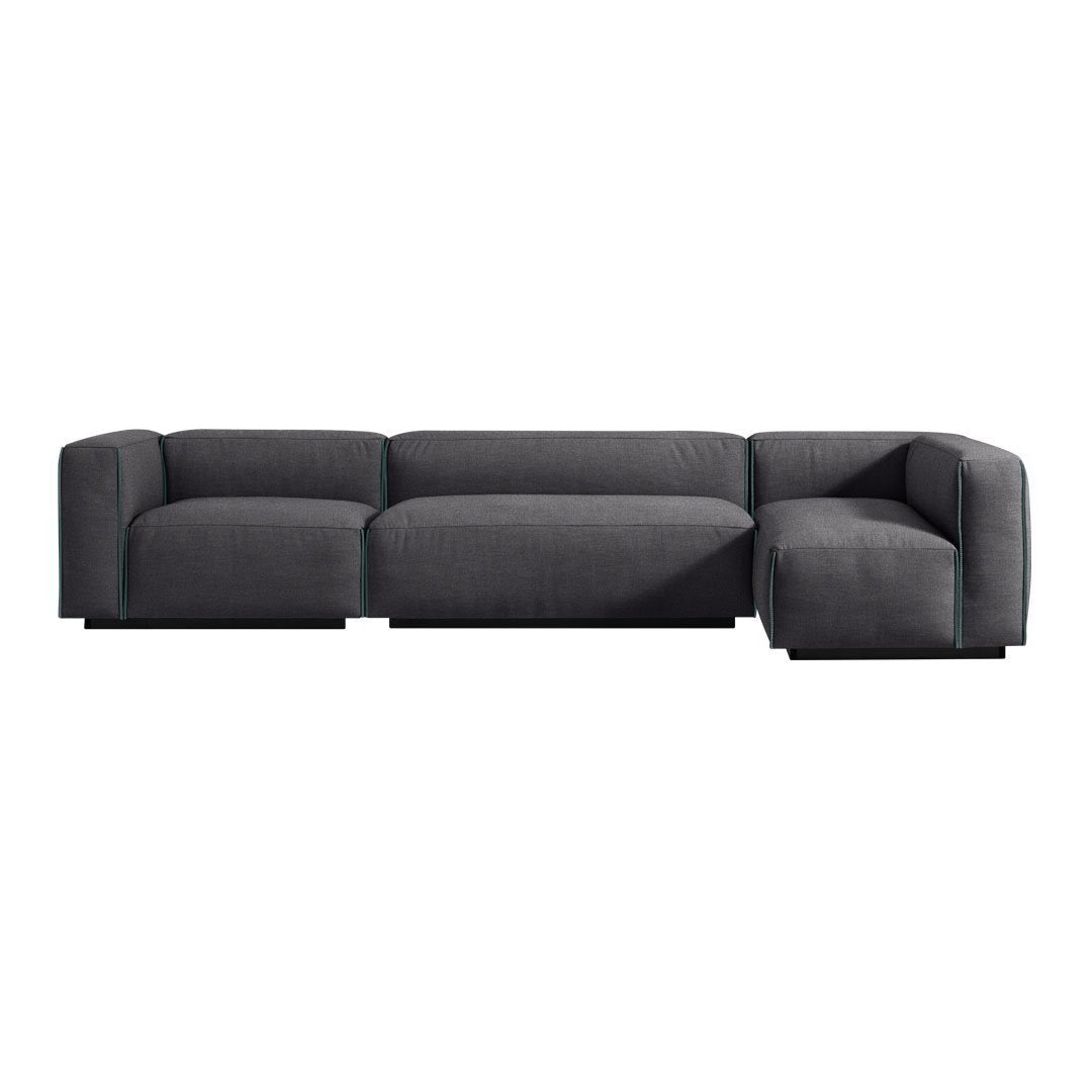 Modern gray sectional sofa with clean lines and subtle textured fabric detail, perfect for contemporary living spaces.