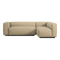 Beige tufted sectional sofa with minimalistic design and clean lines, perfect for modern living spaces.