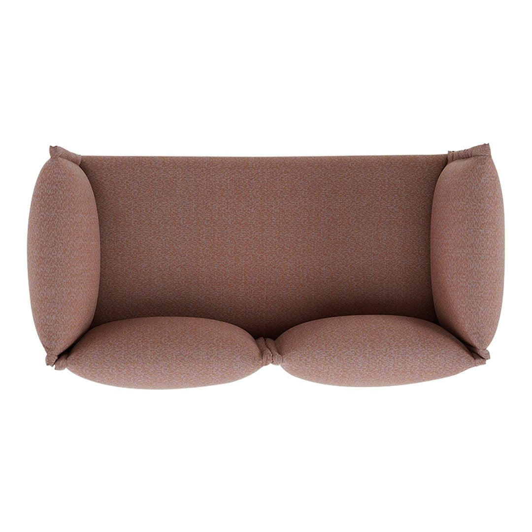 Brown textured sofa with rounded armrests, featuring a warm, neutral color palette for a cozy home decor.