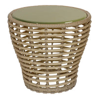 Natural wicker side table with a round, light green glass top and woven pattern design. Perfect for stylish decor.