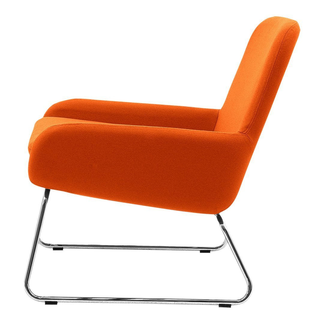 Orange upholstered chair with a sleek chrome base, featuring a minimalist design and clean lines.