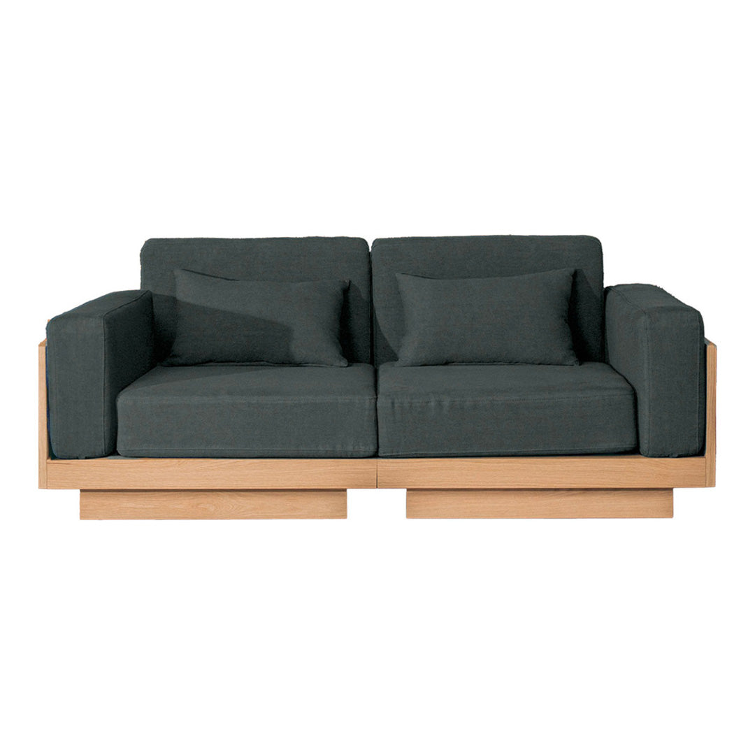 Dark gray fabric sofa with a minimalist wooden base, featuring clean lines and contemporary design.