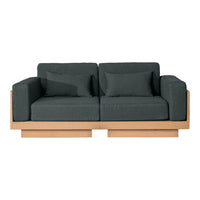 Dark gray fabric sofa with a minimalist wooden base, featuring clean lines and contemporary design.