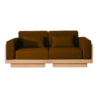 Stylish brown sofa with simple lines and plush cushions, featuring a minimalist wooden base. Perfect for modern decor.