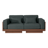 Dark gray upholstered sofa with clean lines and a contrasting brown wooden base, accented by two matching cushions.