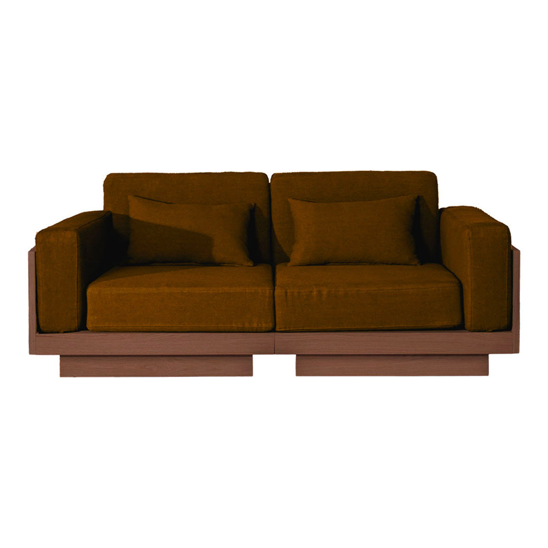 Brown velvet sofa with a modern design, featuring plush cushions and a sleek wooden base. Perfect for stylish interiors.