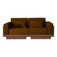 Brown velvet sofa with a modern design, featuring plush cushions and a sleek wooden base. Perfect for stylish interiors.