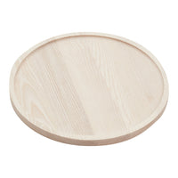 Natural light wood round serving tray with a smooth, polished finish and subtle grain pattern.