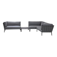 Gray modular outdoor sofa set with sleek lines and geometric patterns, featuring a mix of solid and perforated materials.
